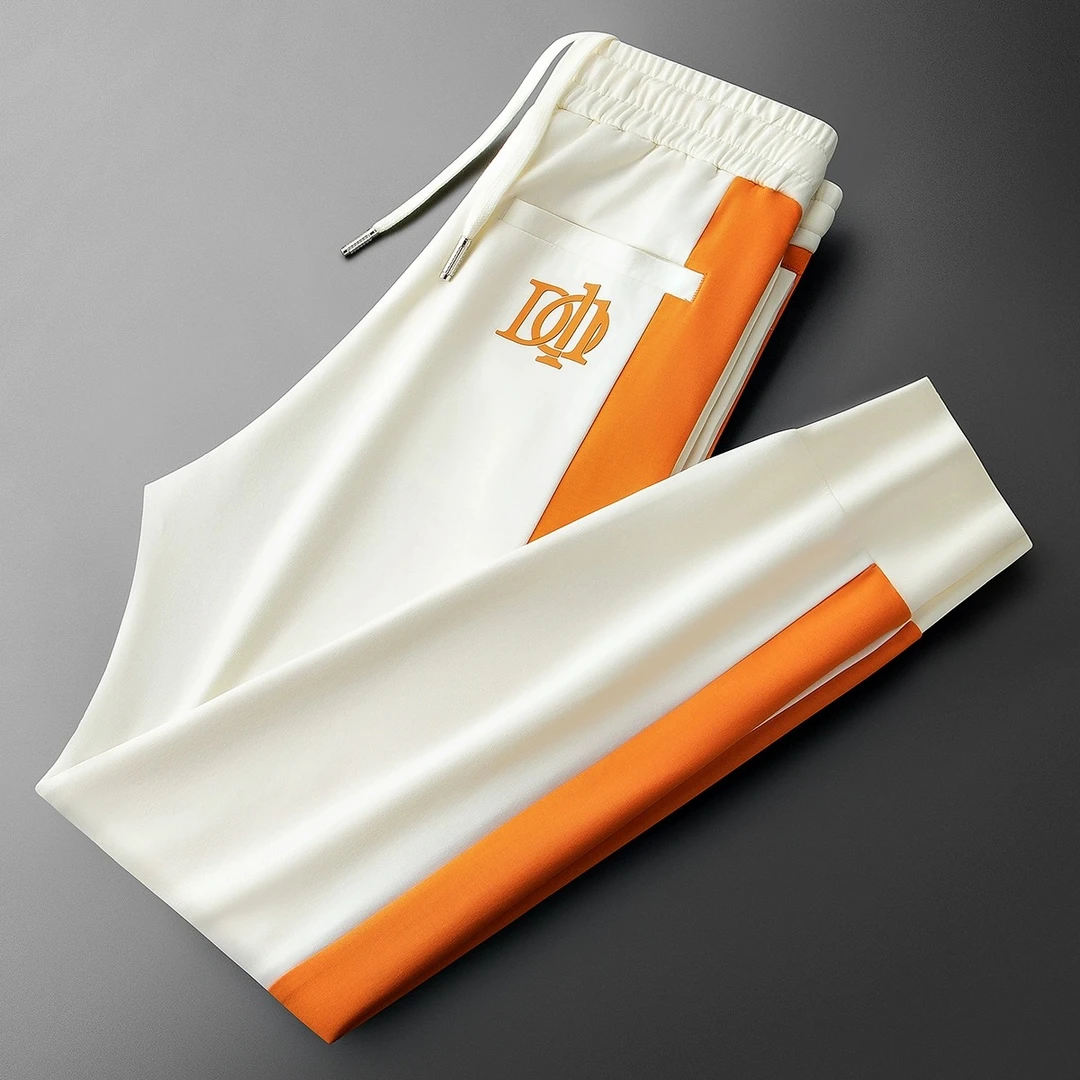 夏季高端时尚潮流撞色拼接冰丝空气层男士修身运动小脚卫裤休闲裤