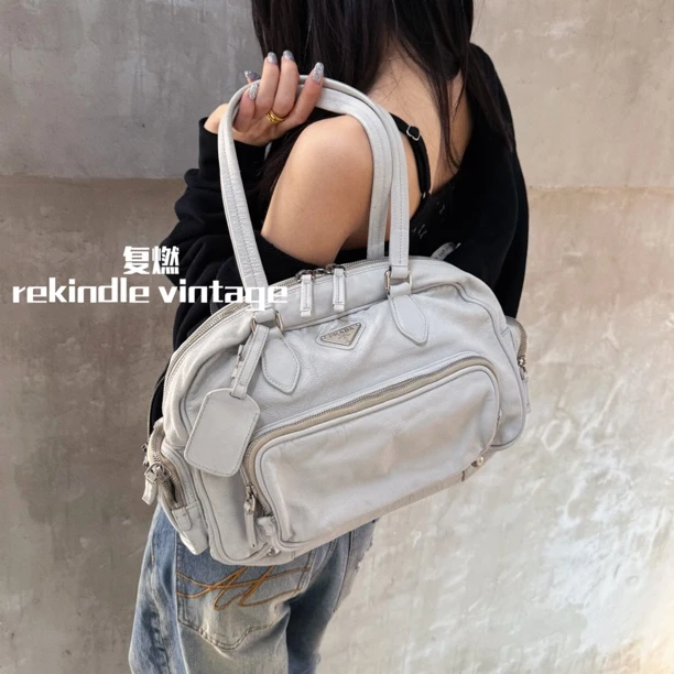 95新 Prada/普拉达 复燃精选/白色油蜡皮双口袋机车单肩包