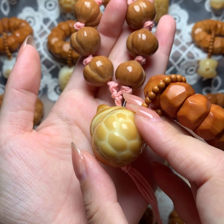 李***錦木质类屁桃手捻富甲一方大