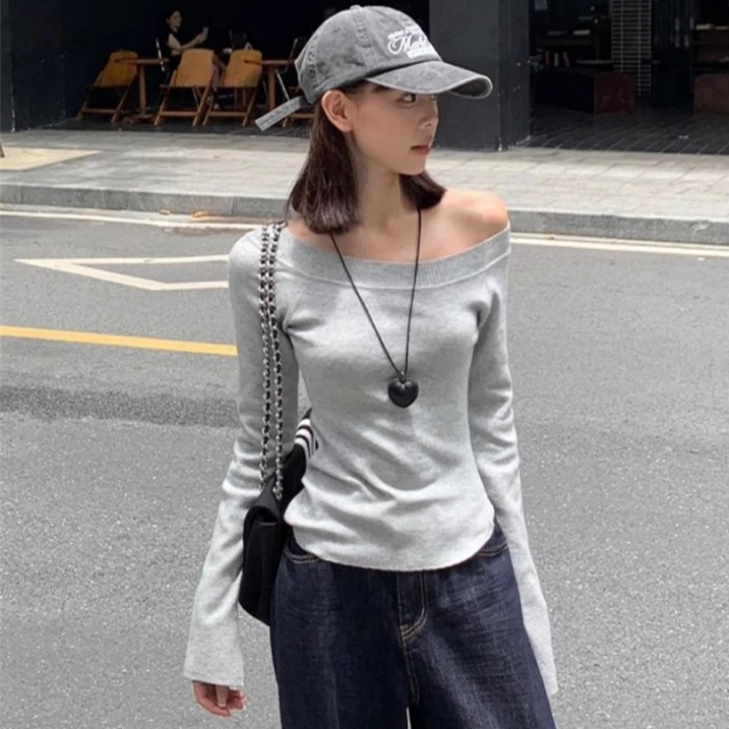 秋冬新款韩系修身显瘦斜领露肩长袖针织衫女气质开叉辣妹打底上衣