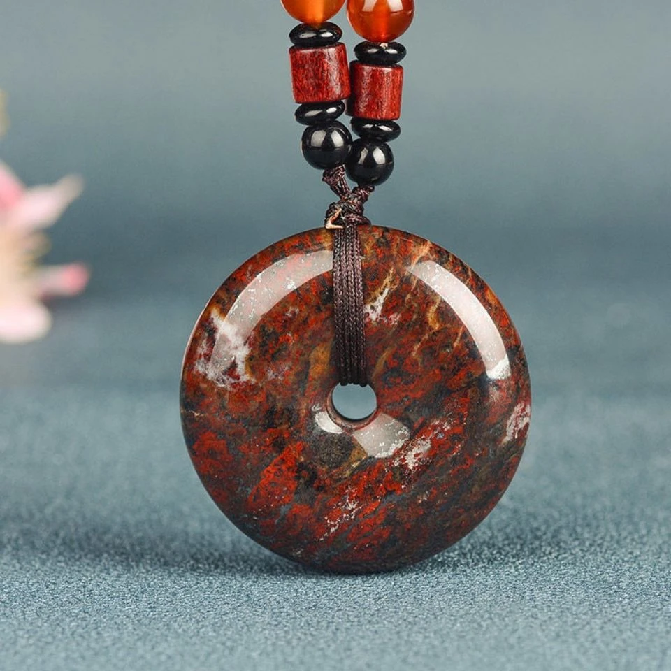 泗水砭石红麒麟红伊丁平安扣手把件