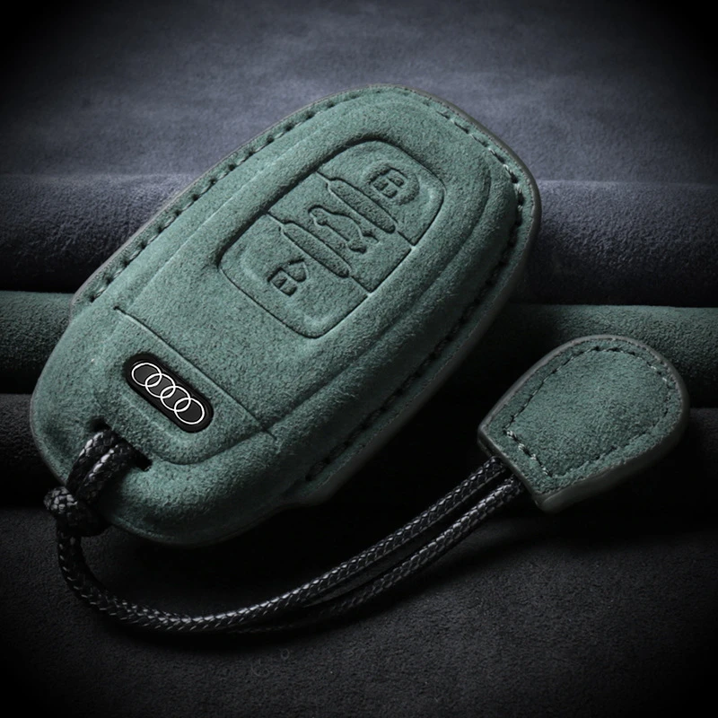 适用老款奥迪高档钥匙套A4L/A5/A6L/A7/A8L/Q5翻毛皮车包扣男女士