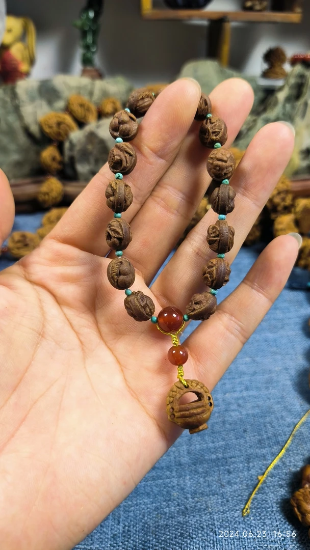 龙纹桃核雕刻多宝手串0.8小尺寸双面雕
