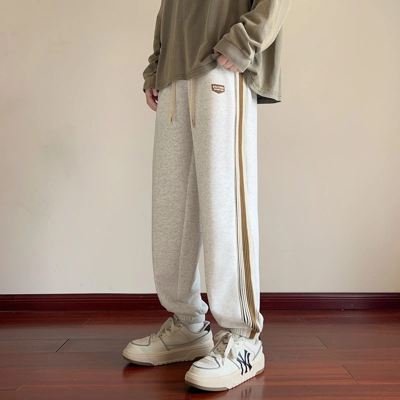 棉质束脚休闲裤子男春季宽松长裤潮牌搭配百搭条纹松紧腰运动卫裤