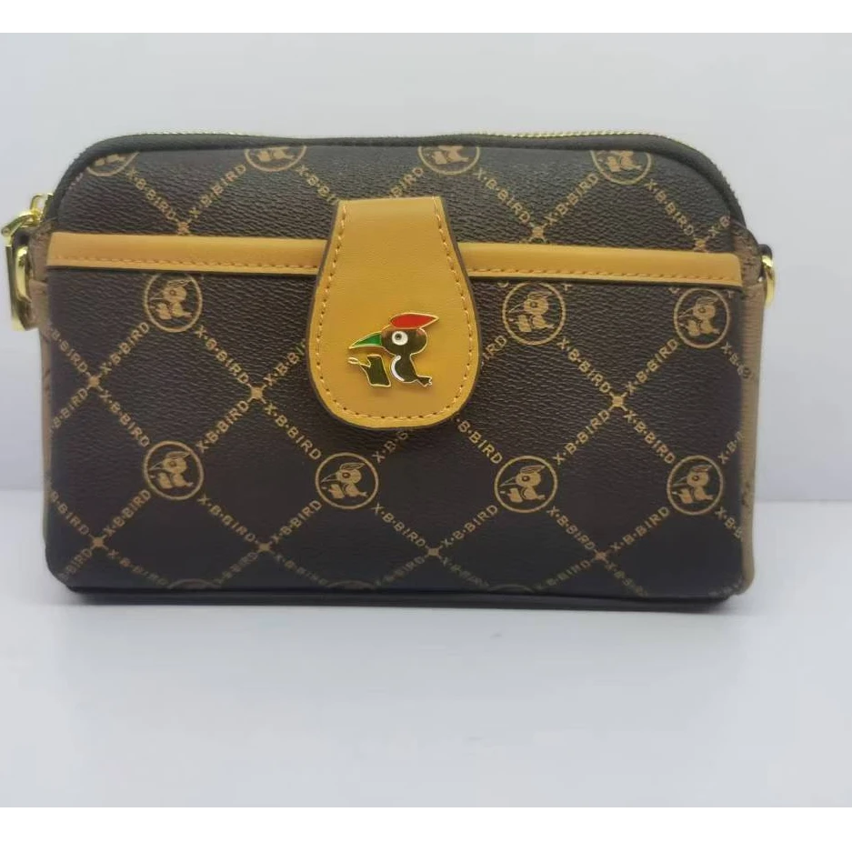 香港喜伴啄木鸟2025时尚款斜挎手拿包