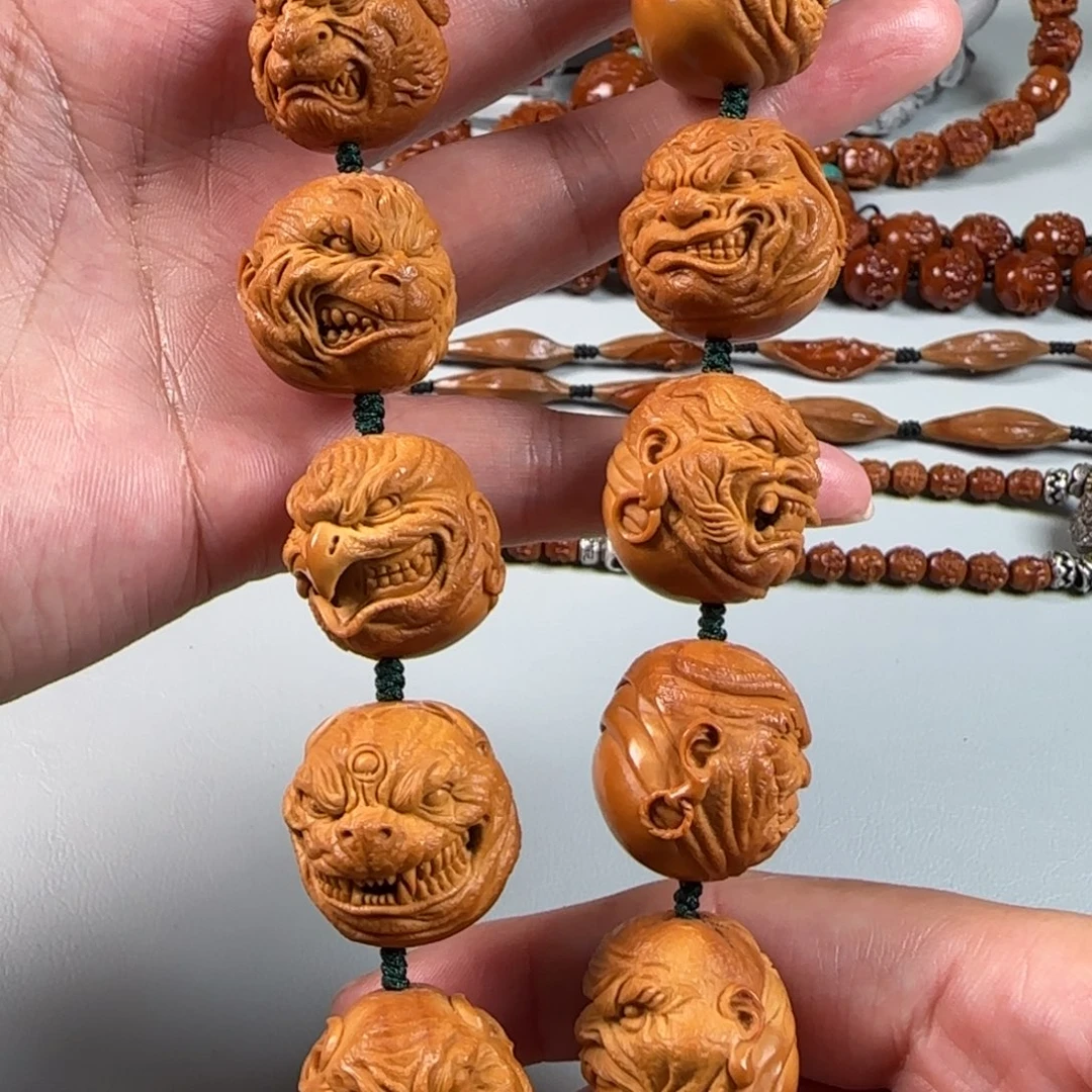 橄榄核核雕宽2.3短圆梅林核十二生肖手持