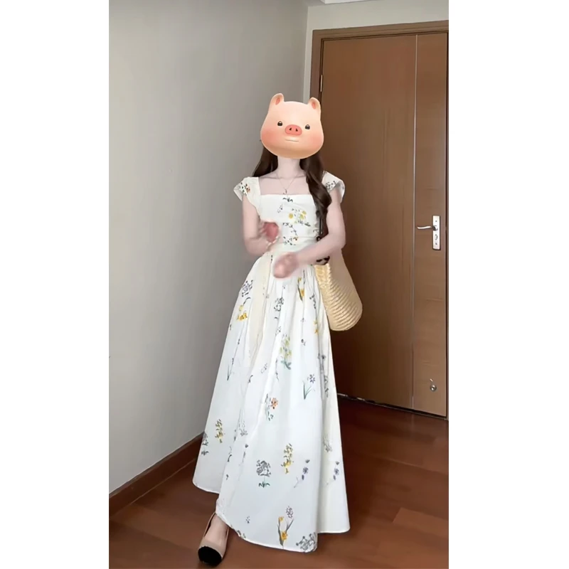 大码新款漂亮独特白色碎花连衣裙夏季茶歇法式收腰度假仙女长裙子