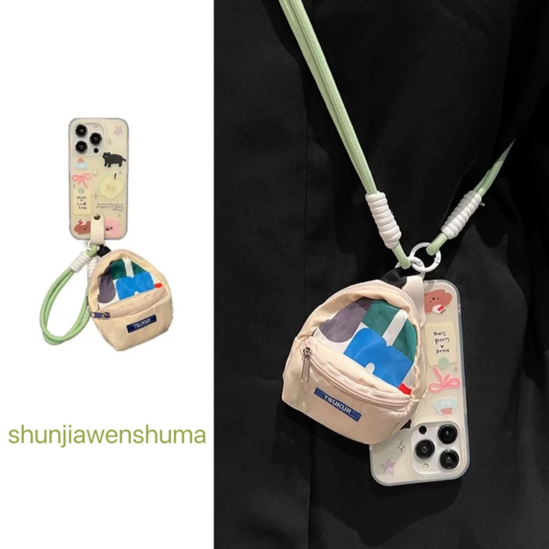 青苹果小黑猫旅游小书包苹果15promax手机壳iPhone14斜挎13手提绳