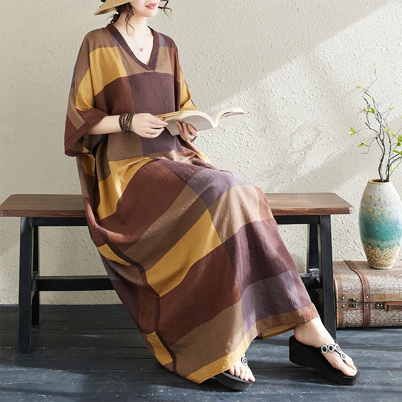 2025夏季花色度假风旅游V领复古长裙遮肉棉麻连衣裙