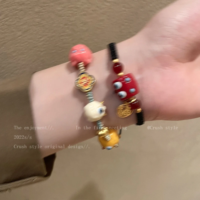 非金属亚克力手链 童趣可爱怪兽福牌编织手链女ins红闺蜜手绳