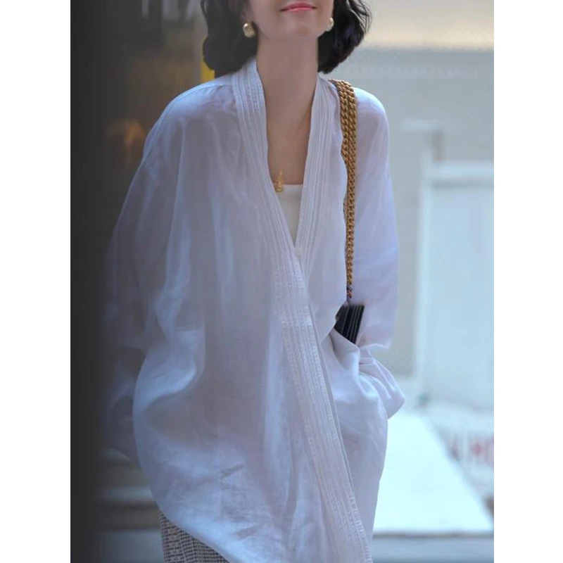 简约纯色气质V领长袖衬衫女2025早秋新款时尚宽松休闲中长款衬衣