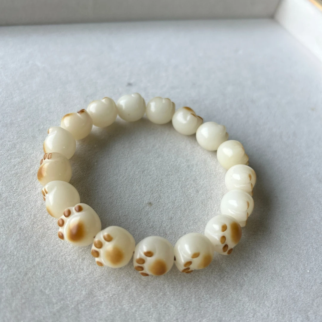 3440文玩好物绕指柔菩提根玉化籽碳烤猫爪13mm