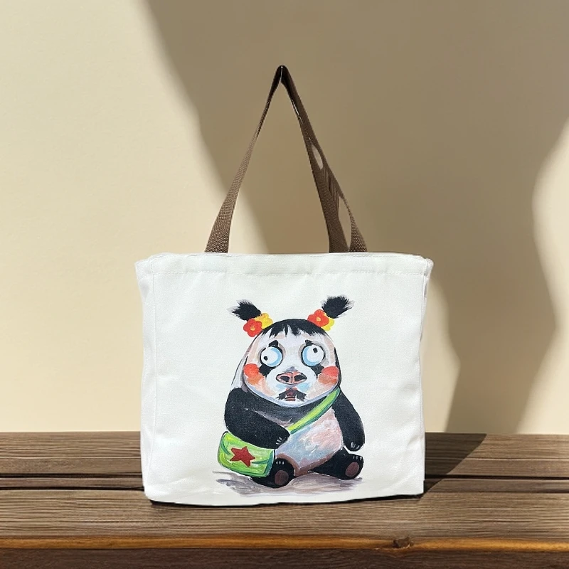 卡通帆布包手提袋小巧便携通勤包简约百搭