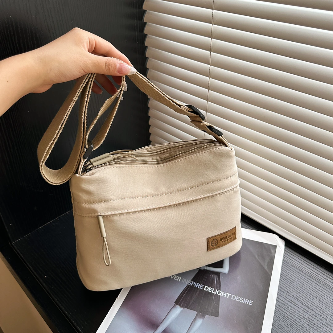 男女同款包包时尚百搭单肩包多隔层斜挎包尼龙水洗布斜挎包女女士