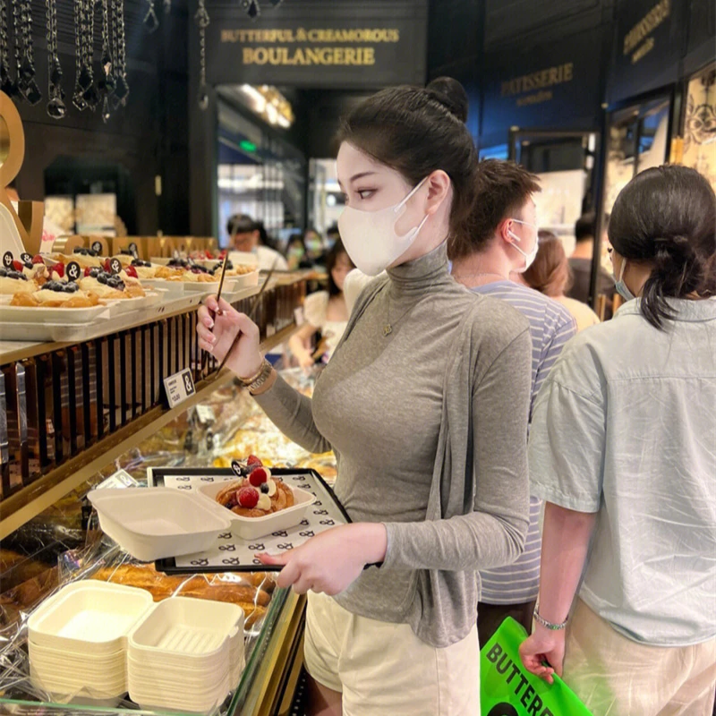 韩版女明星气质优雅性感高领修身无袖背心长袖开衫茶系穿搭套装