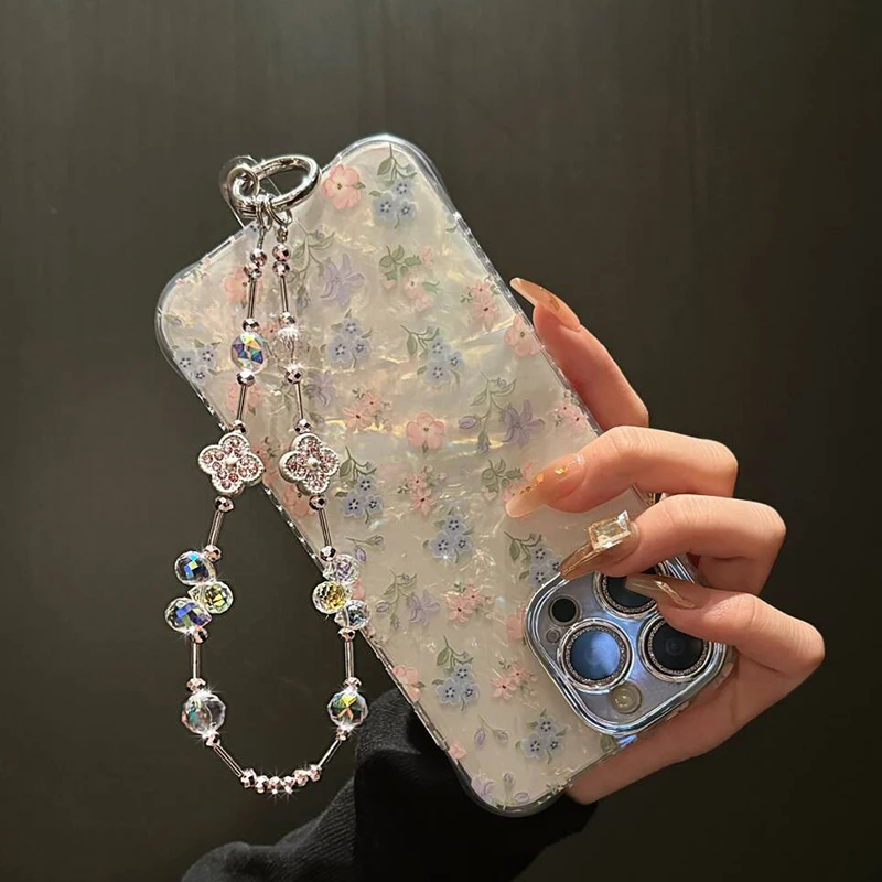 网红新款轻奢高级感幸运草水晶手机手提链条手腕带女款防丢失挂绳