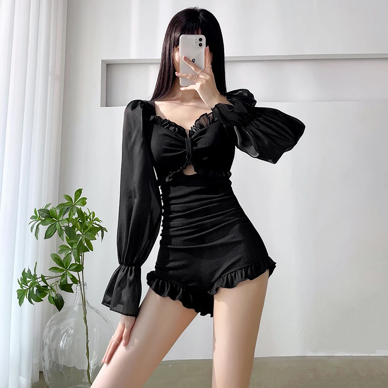 游泳衣新款2025女款泡温泉保守显瘦三角连体泳衣长袖遮肚冲浪泳装