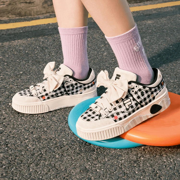 FILA斐乐潮牌女鞋夏【厚底增高】蝴蝶结板鞋 舒适运动鞋T12W432205F