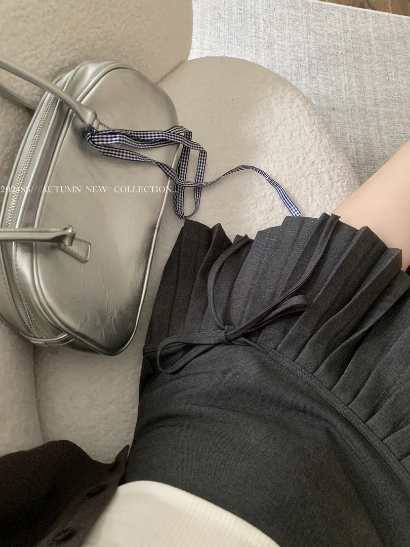 辣妹黑色高腰半身裙女装早秋新款蝴蝶结系带防走光显瘦百搭短裙子