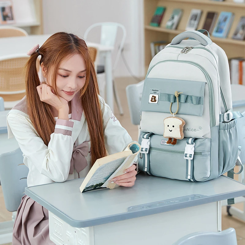 韩版新款初中生双肩包女轻便大容量高中生书包女简约时尚双肩背包