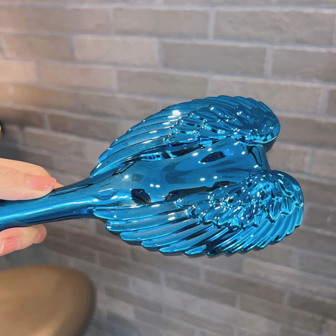 蓝色色新款网红顺发梳魔法梳懒人梳开结梳按摩器王妃梳子