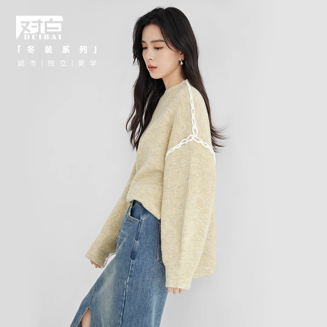 对白温暖别致撞色钩花圆领毛衣女秋冬2023新款花苞袖慵懒针织上衣