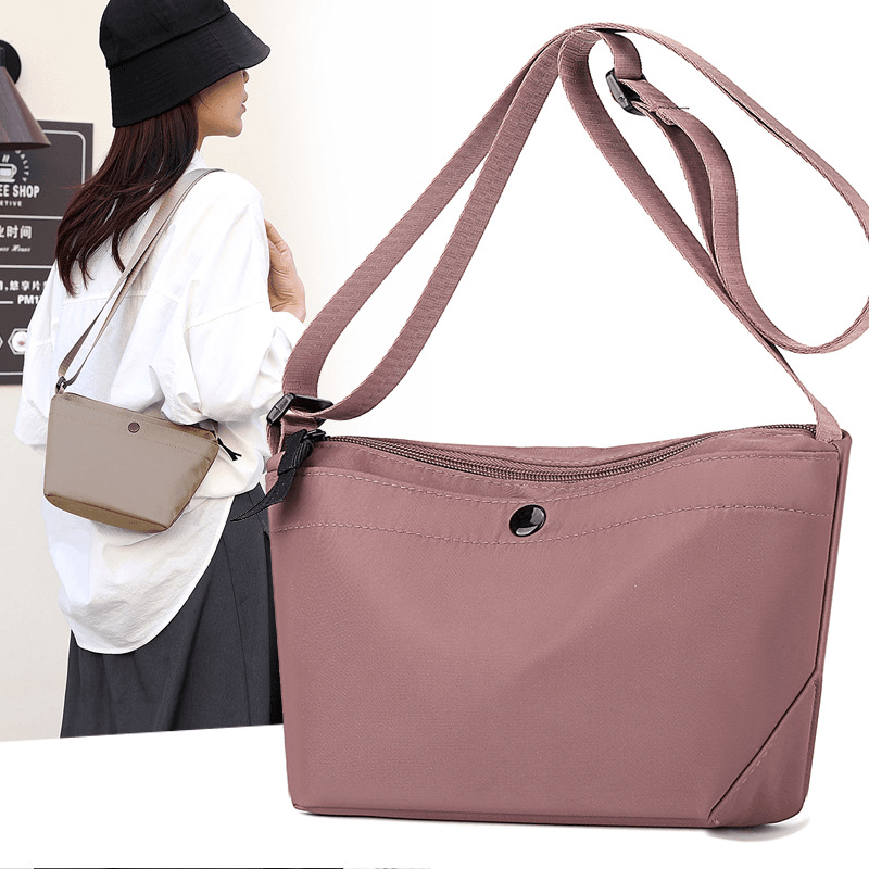 夏季新款超轻便女包牛津布包手机包时尚休闲单肩斜挎手提袋饺子包