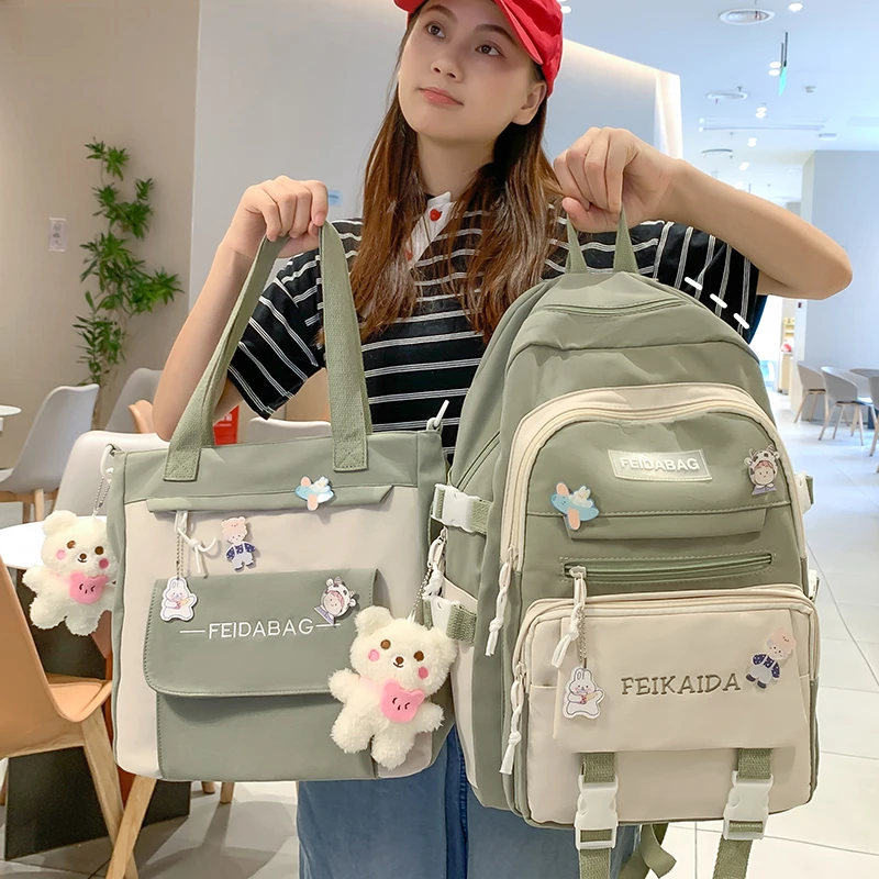 书包女生初中简约小清新可爱小学生双肩包中学生大容量轻便背包