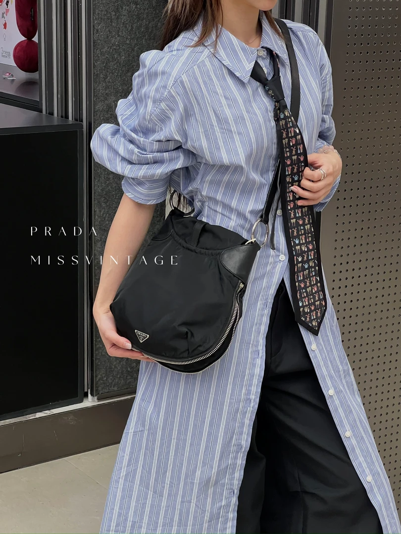 95新 Prada/普拉达 觅时/三角标拉链底斜挎/113464