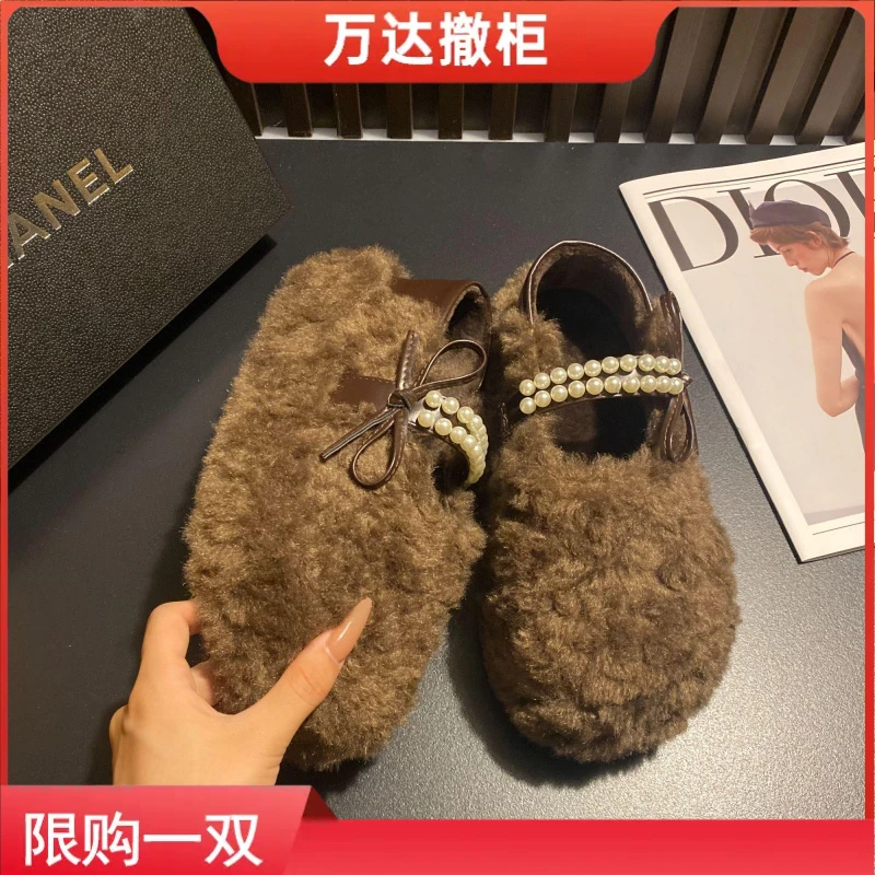 万达撤柜品牌厚底豹纹蝴蝶结一脚蹬两穿毛毛鞋女加绒韩版百搭棉鞋