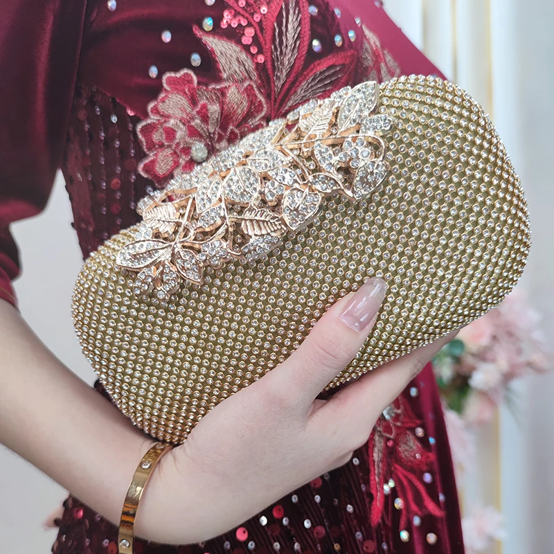 时尚高端晚宴婚礼晚礼服连衣裙搭配手拿包