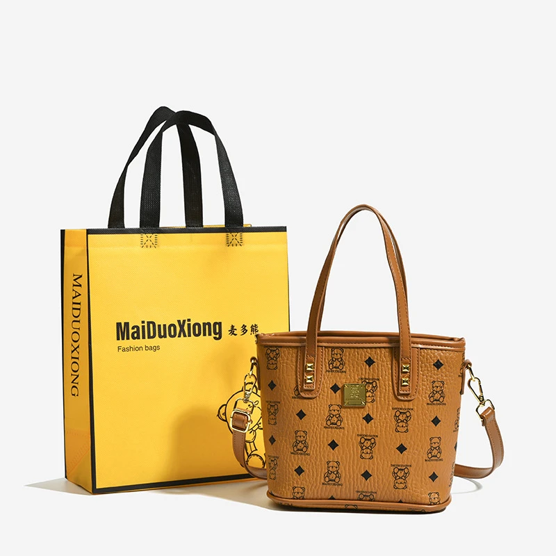 包包女新款单肩斜挎女包时尚印花可爱小方包水桶包韩版菜篮子