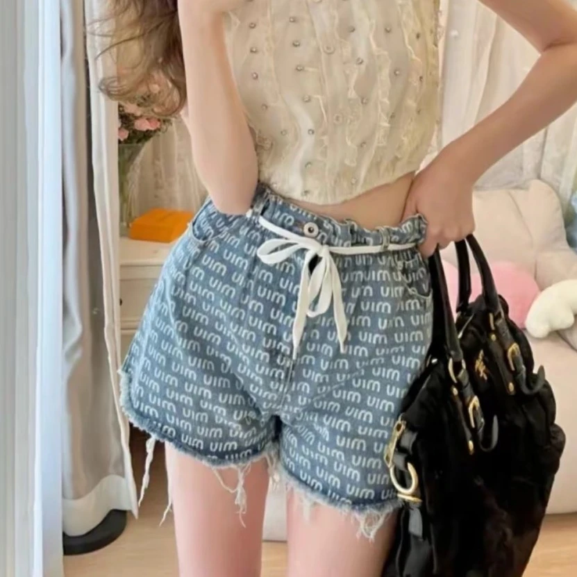 未使用 MIU MIU/缪缪 Miu Miu  Logo满印牛仔短裤/公价9300/26码