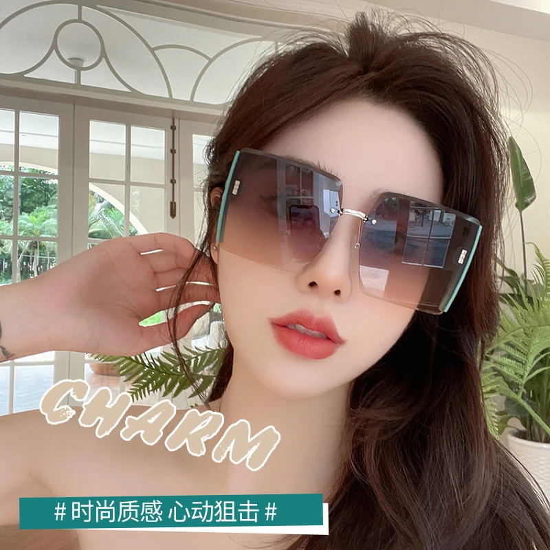 [极速发货 免费试戴]新款个性无框墨镜太阳镜女大脸显瘦时尚