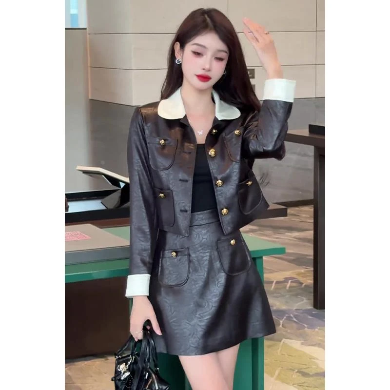 早秋穿搭2024年新款小个子时尚感黑白撞色皮衣高腰半身裙套装