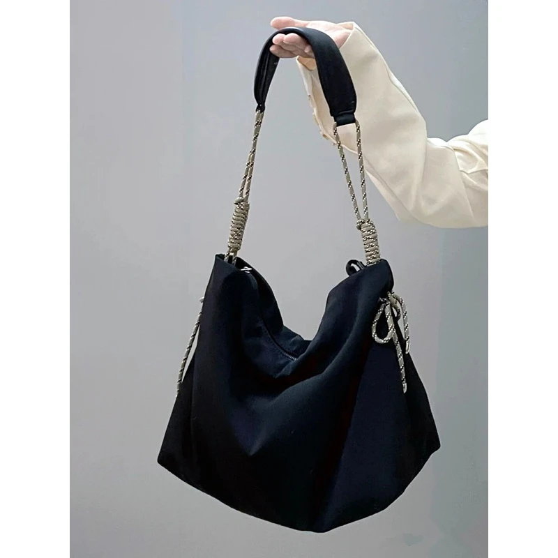 肩包女托特包新潮学院风大容量休闲绳结可调节单肩斜挎包牛津布包