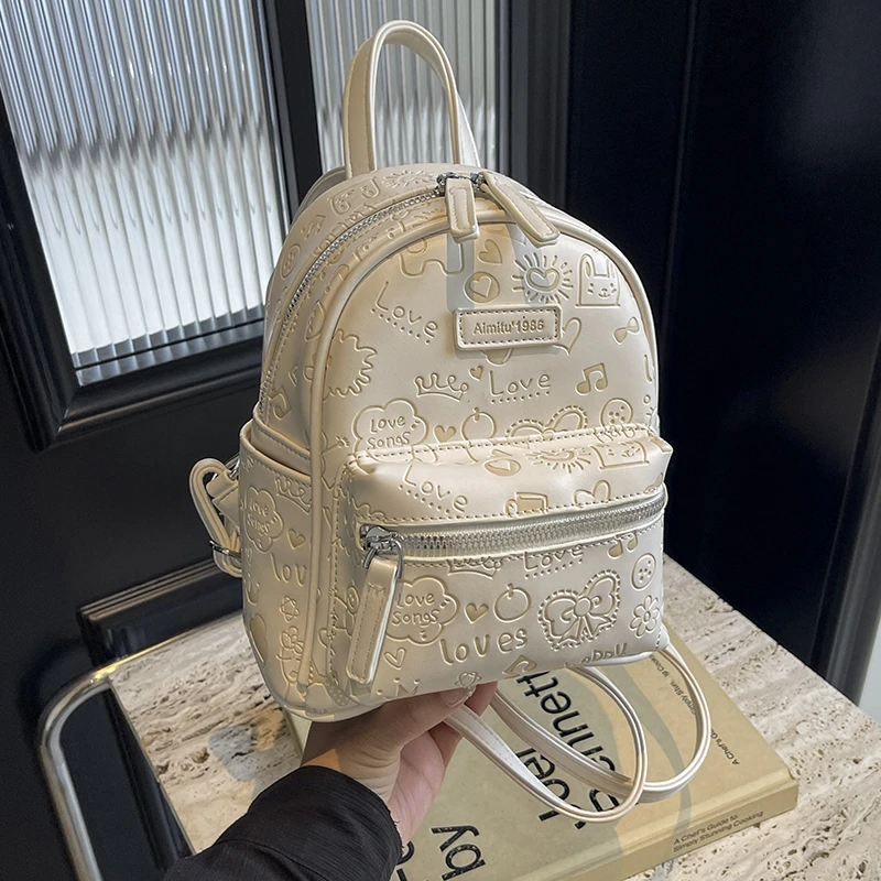 艾米兔女包可爱图案印花设计手提包2025新款简约休闲双肩背包