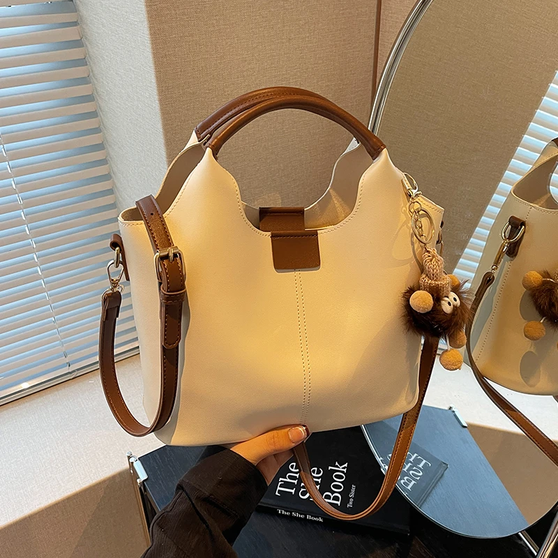 艾米兔女包2025新款小众韩版休闲质感可爱挂件手提斜挎包