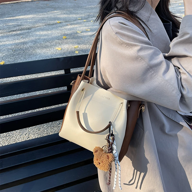 艾米兔女包今年流行新款撞色通勤包包女潮流百搭单肩斜挎托特包