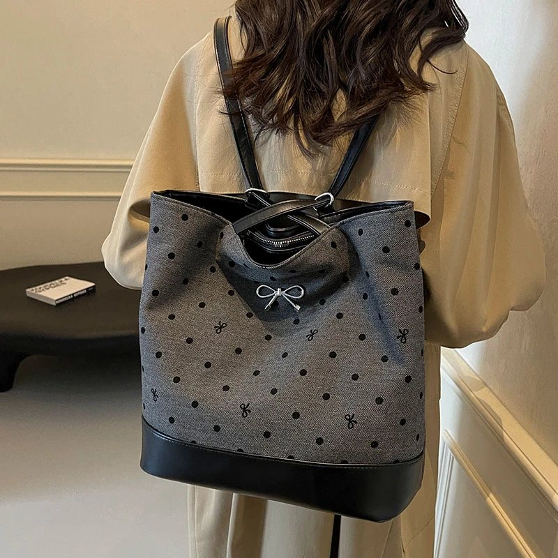 艾米兔女包2024新款简约休闲波点双肩包通勤百搭小众单肩托特包