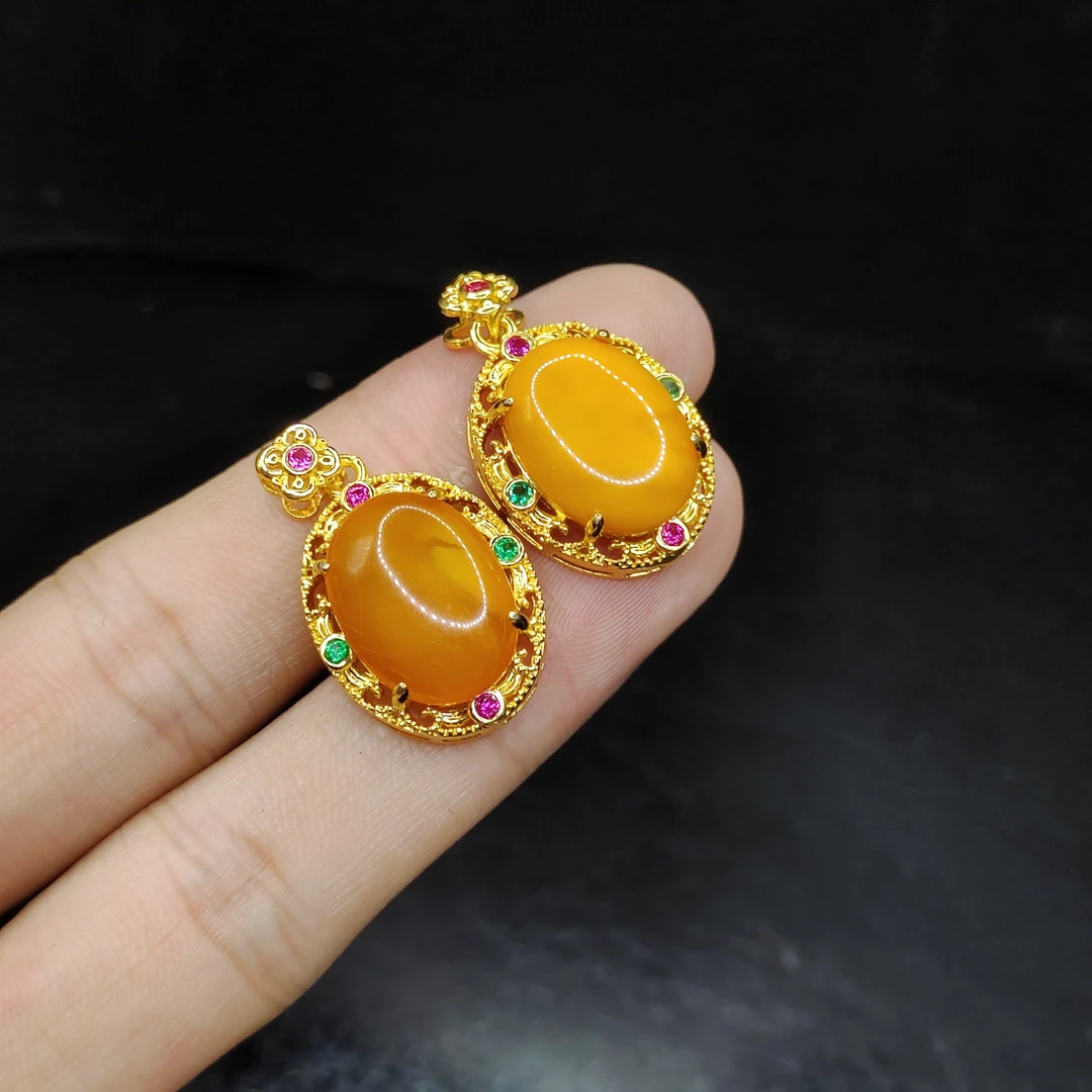 【老三珠宝】蜜蜡鸽子蛋面吊坠赠皮绳X9【多样性发其一】约15-12-5mm