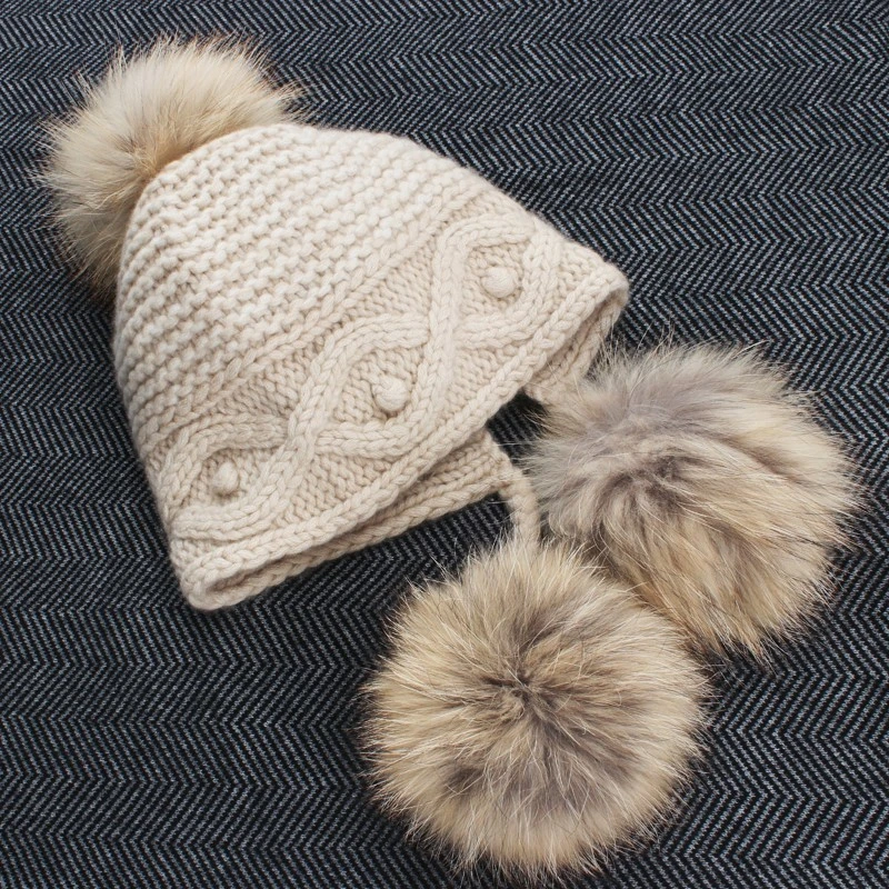 华丽爆款来袭！意大利设计粗线羊绒貉子毛球护耳帽女加厚可爱保暖