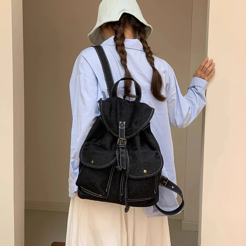 2024新款复古牛仔布旅行通勤双肩包简约轻便大容量小众大学生书包