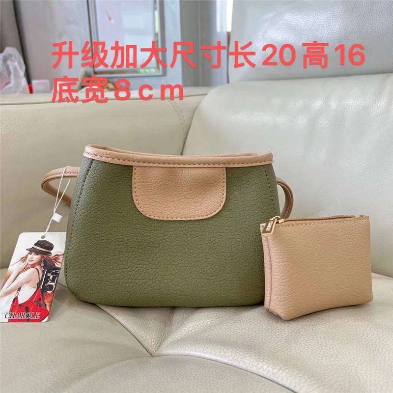 真皮质感新款时尚百搭女士简约单肩包斜挎包2091拼色水桶包