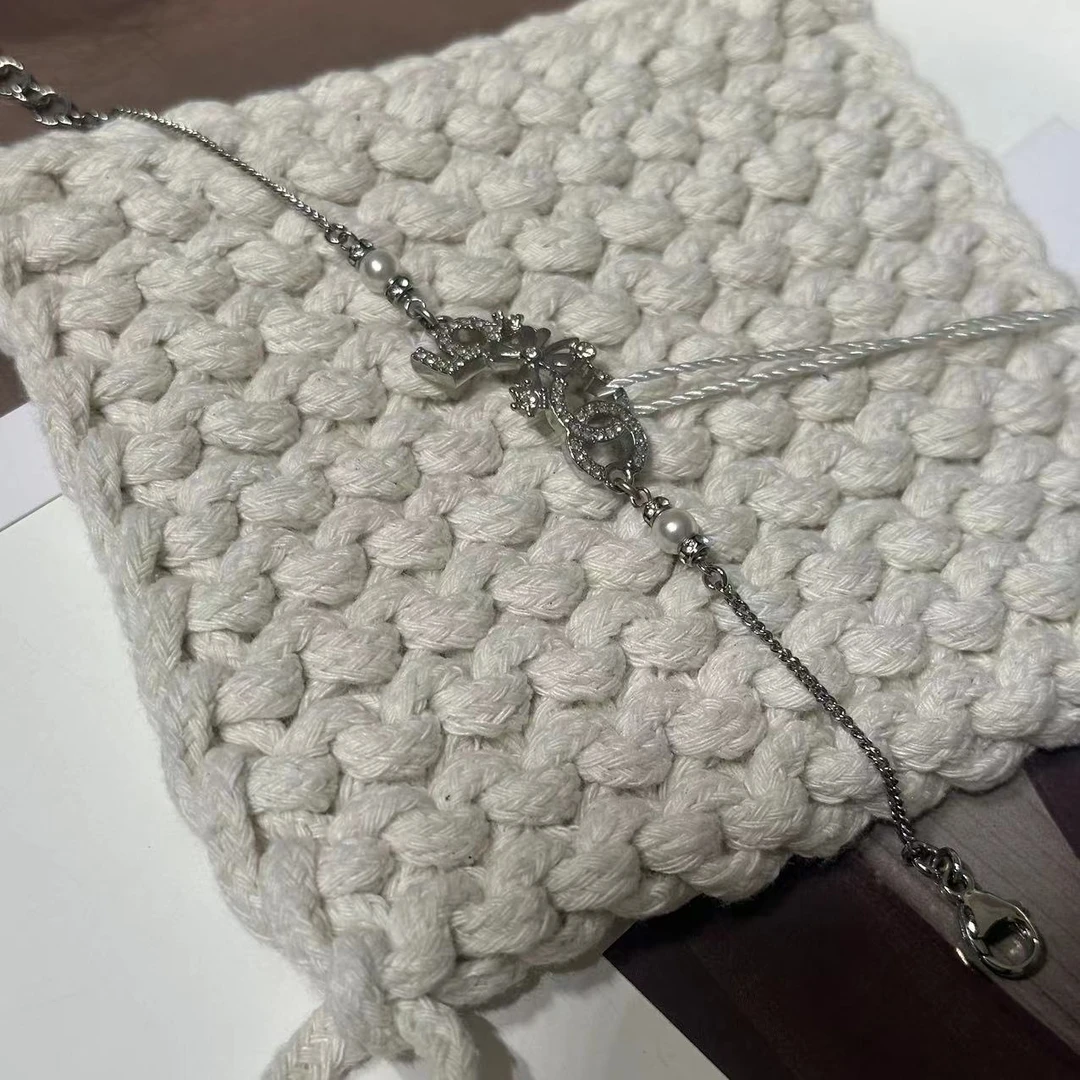 99新  HIHI/Chanel 23P 银色双C镶钻5号四叶草珍珠手链/9101629