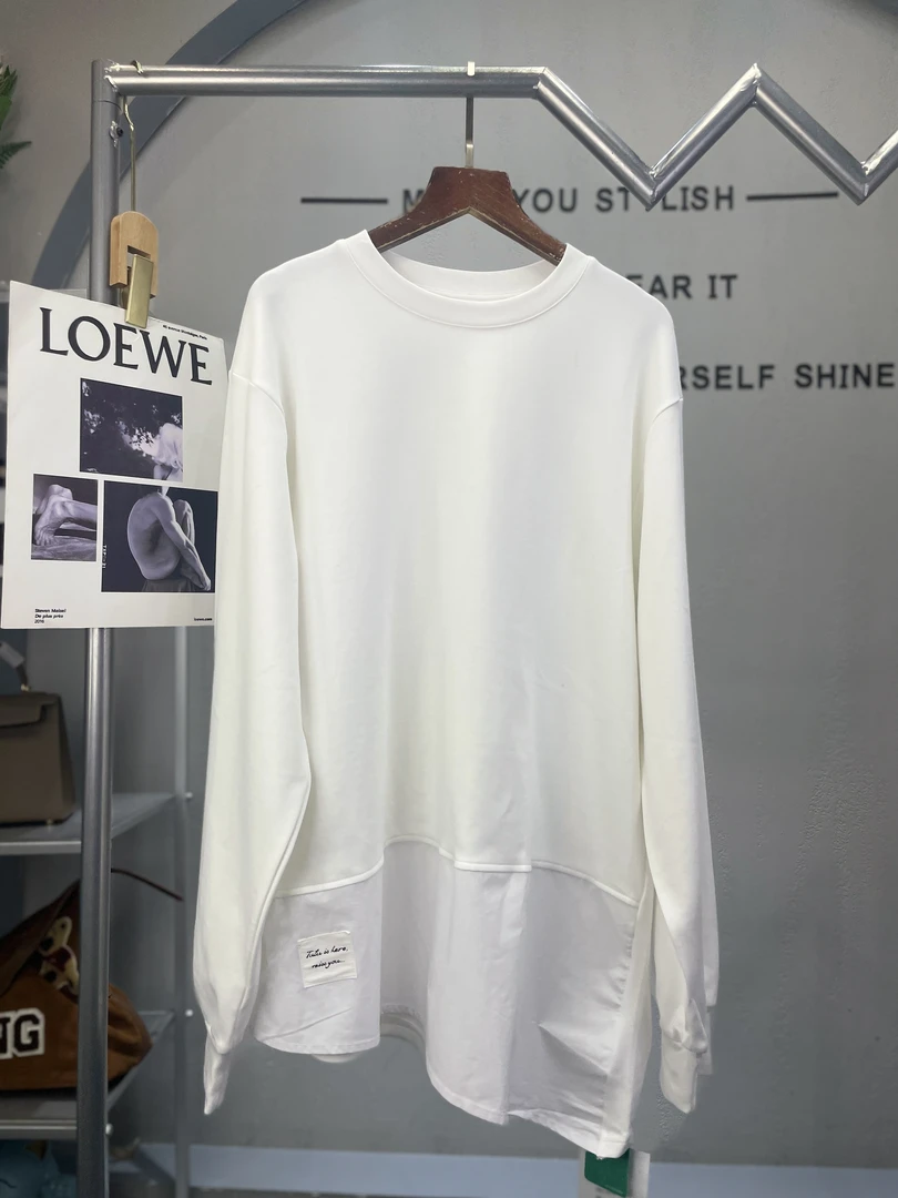 君家纯色不规则下摆设计打底衫