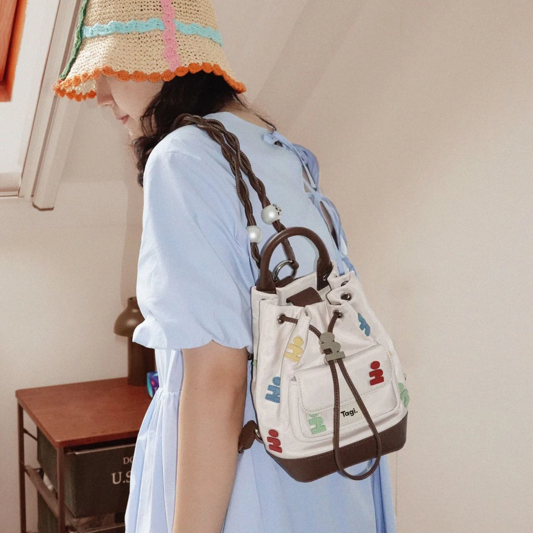 画家双肩包 想象积木手工珍珠编织肩带随行束口包时尚休闲百搭