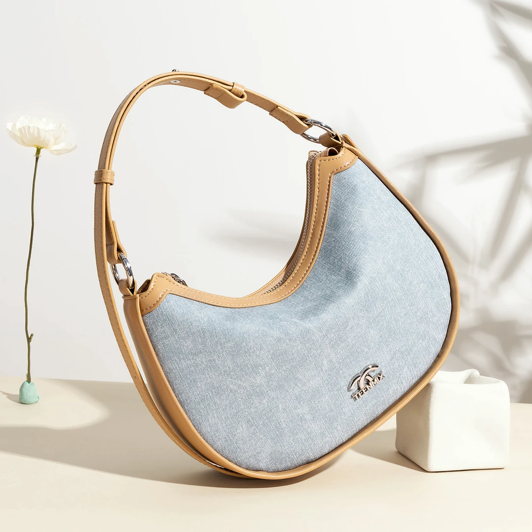 天美意女包2025新款丹宁牛仔腋下包百搭通勤撞色月牙包单肩斜挎包