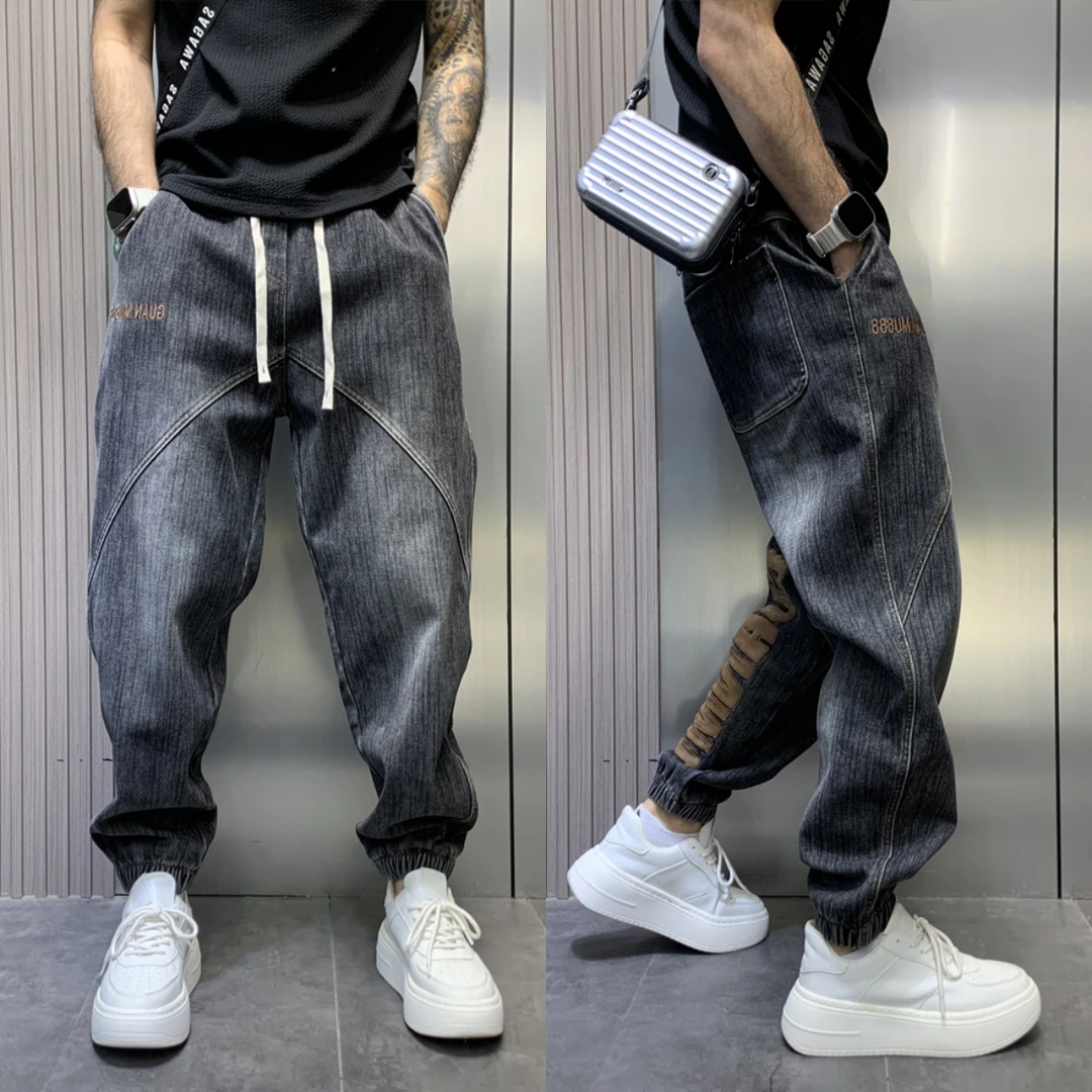 秋冬潮牌牛仔裤男款加肥加大刺绣字母束脚休闲裤宽松大码哈伦裤子