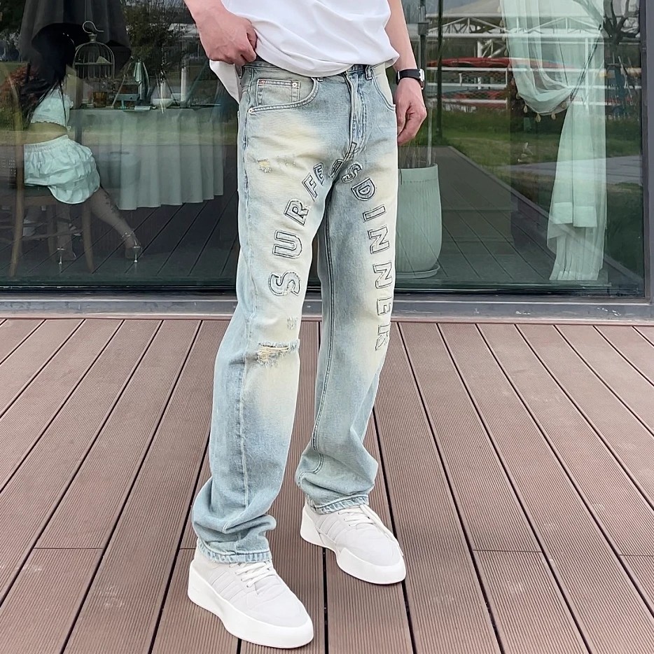 创恒（荷尔蒙）夏季新品时尚弯刀贴布字母破洞复古水洗潮流牛仔裤